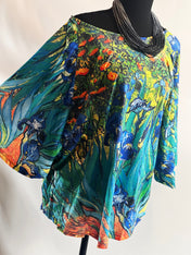 Irises by Van Gogh Loose Fit Batwing Top: A Floral Masterpiece Adorns this Effortlessly Stylish and Comfortable Fashion Statement